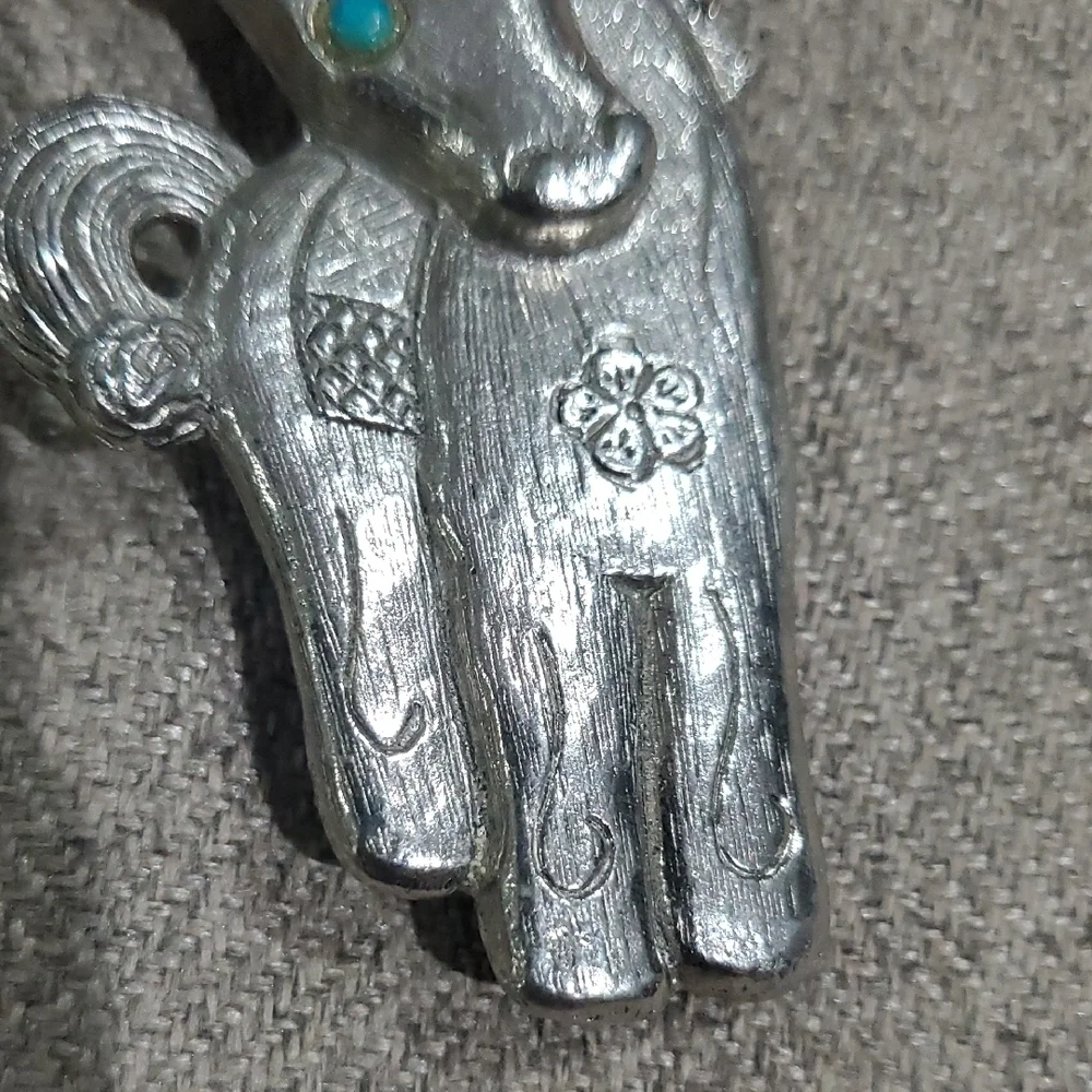 Vintage Silver Tone Horse Pony Brooch with Blue Eyes And Flower Accents Western